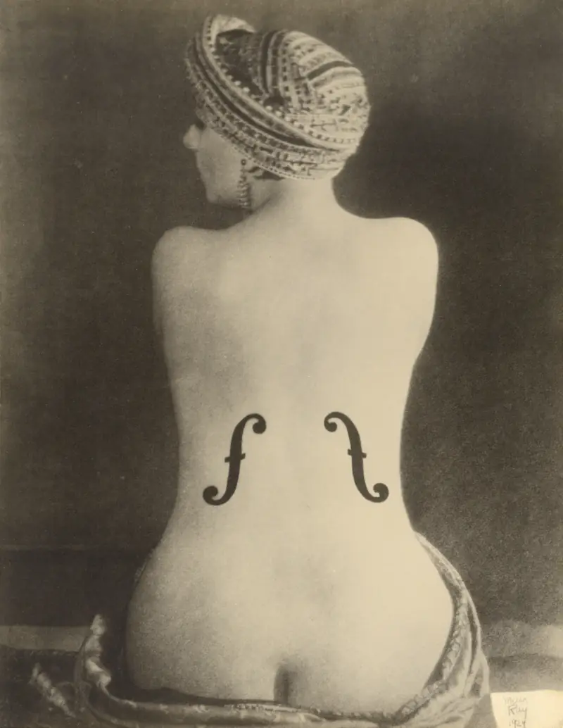 Le Violon d'Ingres, 1924: a woman's bare back in a turban, with two violin f-holes printed onto her skin.