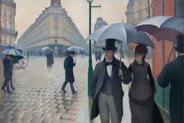 Gustave Caillebotte's painting Paris Street; Rainy Day: Parisians under umbrellas crossing a wet cobblestone intersection on an overcast day.