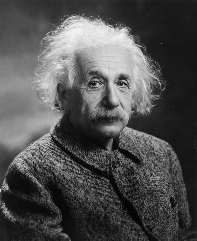 Black-and-white portrait of an older Albert Einstein in 1947, looking into the camera.