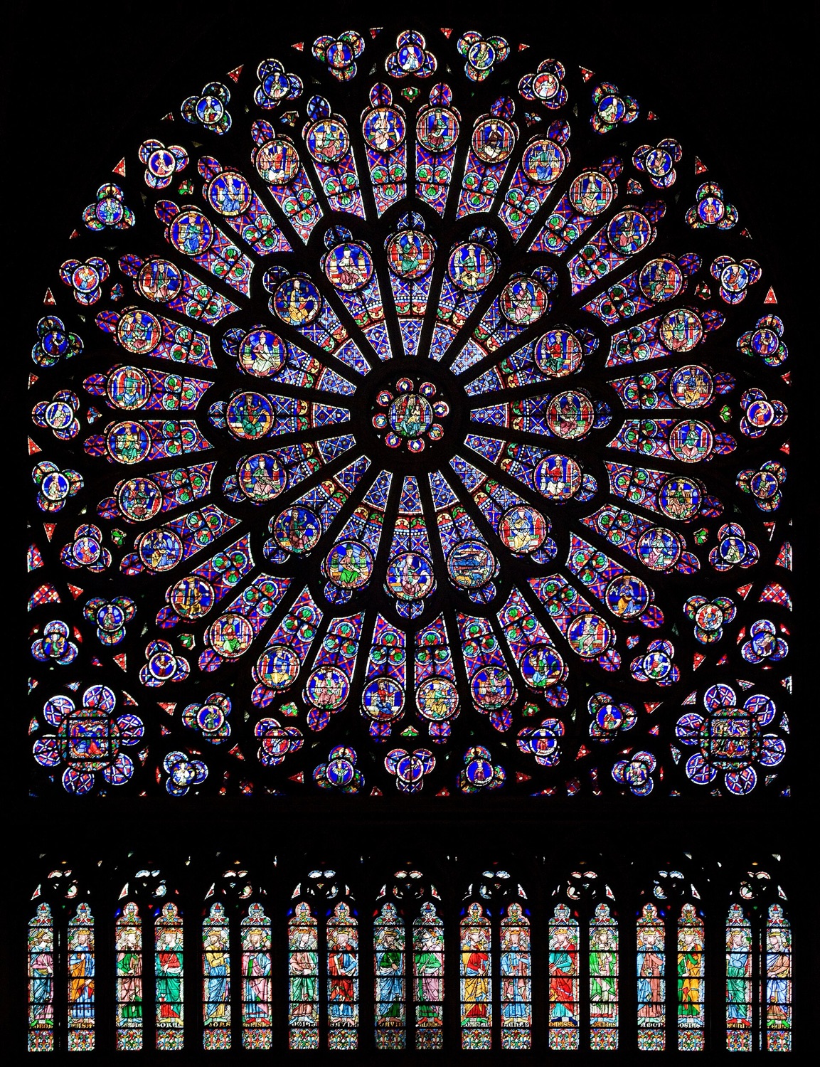The blue stained-glass north rose window of Notre-Dame de Paris, a vast wheel of medieval coloured glass.