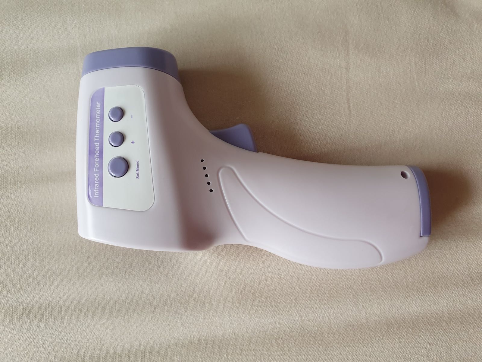 A non-contact infrared forehead thermometer.