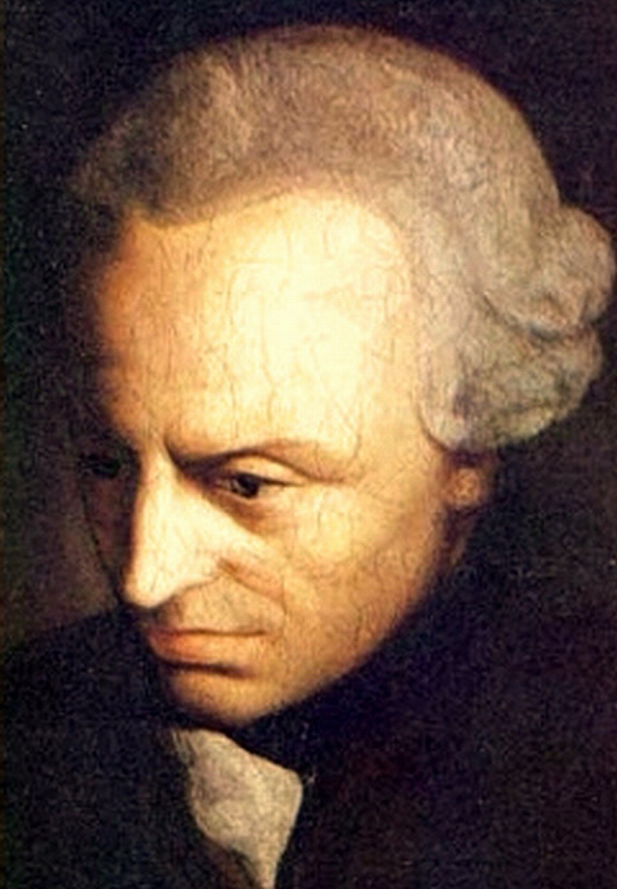 A close portrait of Immanuel Kant against a black ground: a pale, sharp-featured man with a high domed forehead and grey powdered hair curled at the sides, in a dark coat with a white collar, his eyes lowered.