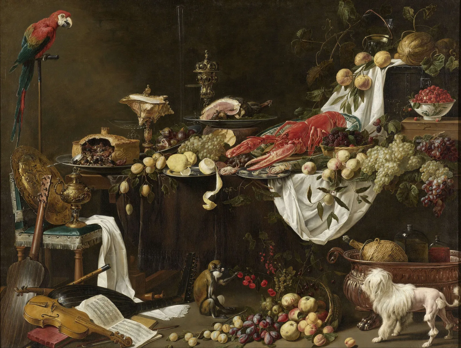 A lavish Flemish banquet still life: a table piled with a lobster, fruit, bread, a half-peeled lemon, wine, and gleaming silver and glassware against a dark ground.