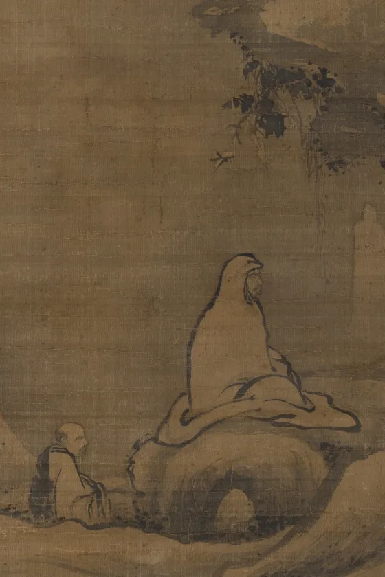 A Song-dynasty ink painting: a lone robed monk sits in profile on a rock before a cliff face, a small attendant below him, surrounded by empty misty silk.