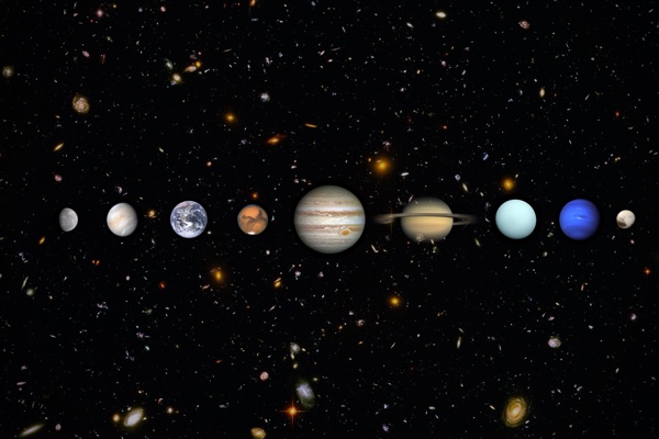 A dark green card reading How Old Are You in Space, with a lineup of the real planets from Mercury to Pluto, including ringed Saturn, beneath it.
